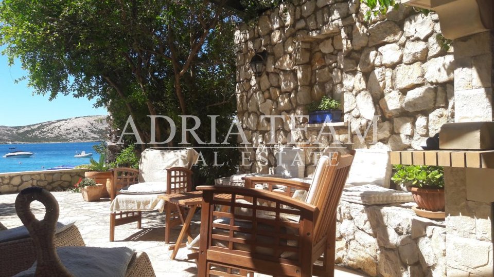 BEAUTIFUL APARTMENT WITH TERRACE AND GARDEN DIRECTLY ON THE BEACH, STARA NOVALJA