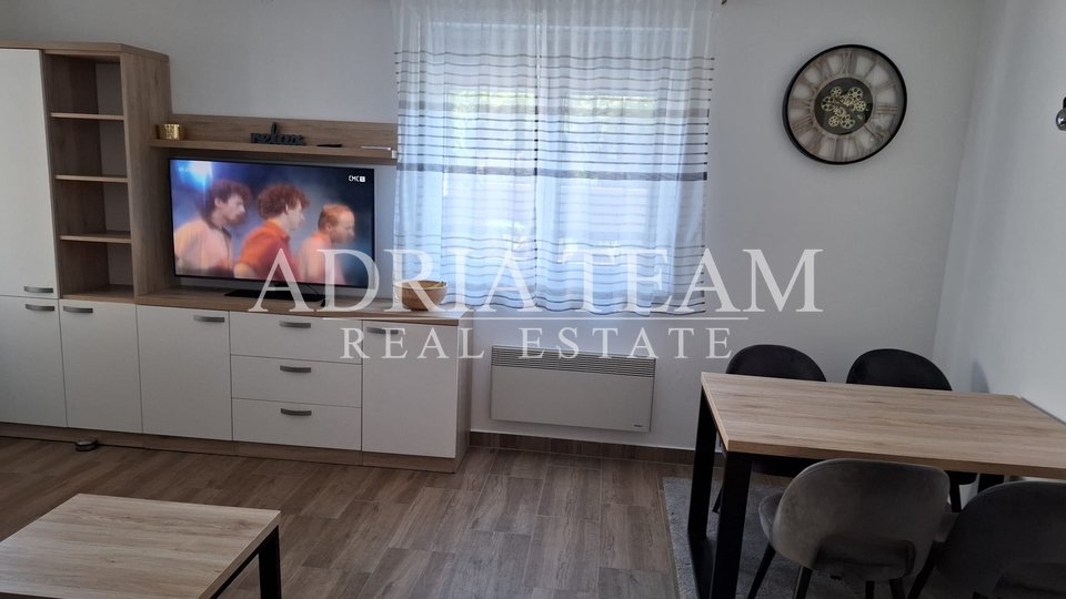 THREE-BEDROOM APARTMENT IN A RESIDENTIAL BUILDING, GROUND FLOOR - POVLJANA, PAG