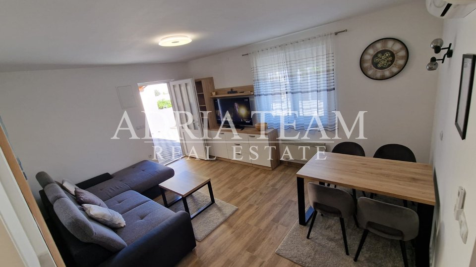 THREE-BEDROOM APARTMENT IN A RESIDENTIAL BUILDING, GROUND FLOOR - POVLJANA, PAG