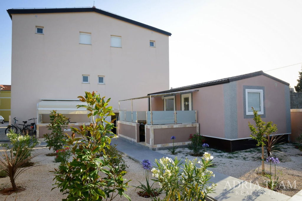 BASEMENT APARTMENT WITH A POOL AND LARGE GARDEN – PRIVLAKA