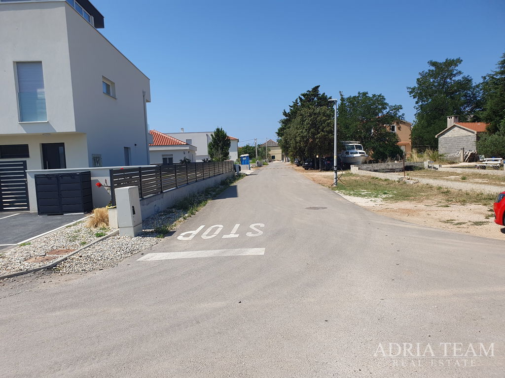 BUILDING PLOT WITH ISSUED PROJECT AND PERMIT – PRIVLAKA, MLETIK