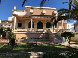 TWO-STOREY HOUSE WITH THREE APARTMENTS – FIRST ROW TO THE SEA – STARA NOVALJA, ISLAND OF PAG property for sale