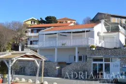TWO-STOREY HOUSE WITH 4 APARTMENTS AND HOSPITALITY BUSINESS – FIRST ROW TO THE SEA – MASLENICA property for sale